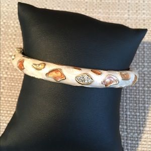 Unique animal print enamel cuff in neutral tones.